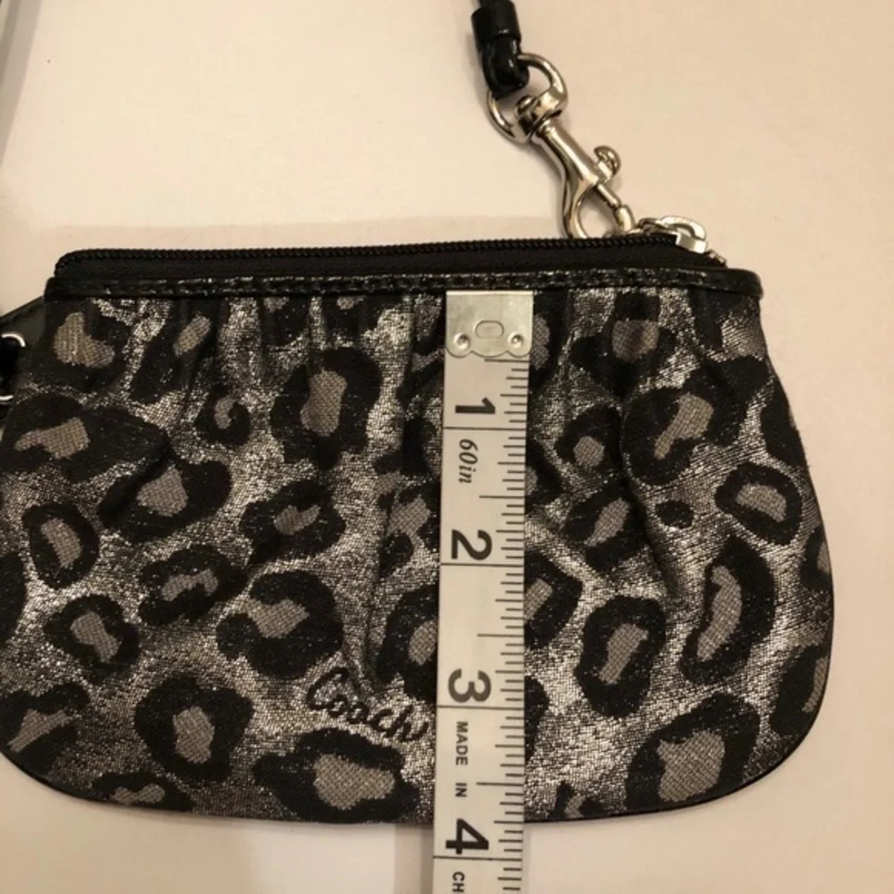 Coach black leopard wristlet metallic silver gray